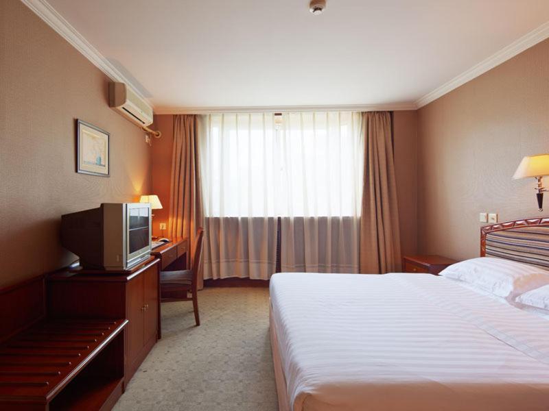 Starway International Sports Hotel Pekín Habitación foto